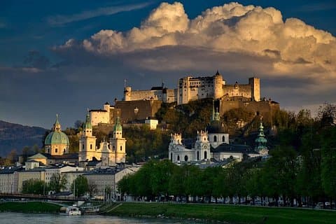 Fairytale Atmosphere: Experience the magical, romantic vibe of Salzburg, a city that seamlessly blends music, deep history, and stunning scenery.