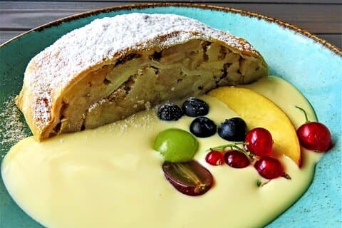 Indulge in the Heavenly Flavors of a Perfectly Baked Apple Strudel"