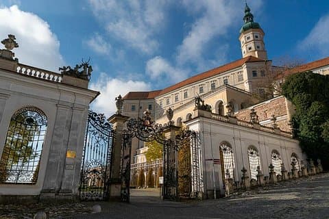 Welcome to Mikulov: Step through the ornate iron gates of the majestic hilltop castle that dominates this historic wine town.