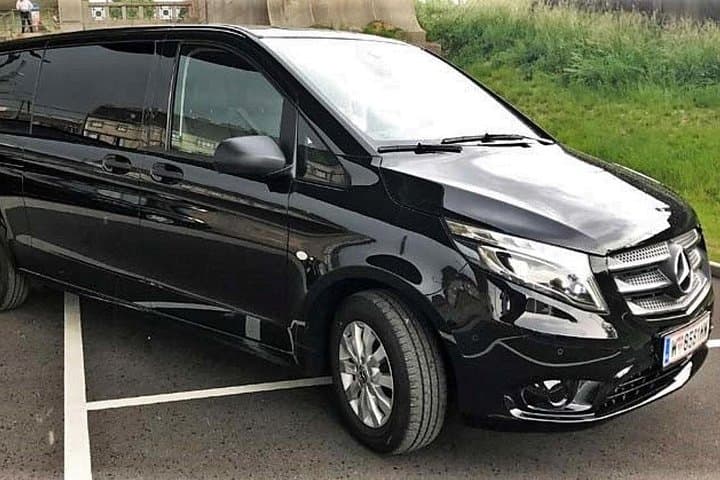 Late model van or sedan (AC & chauffeur driven)