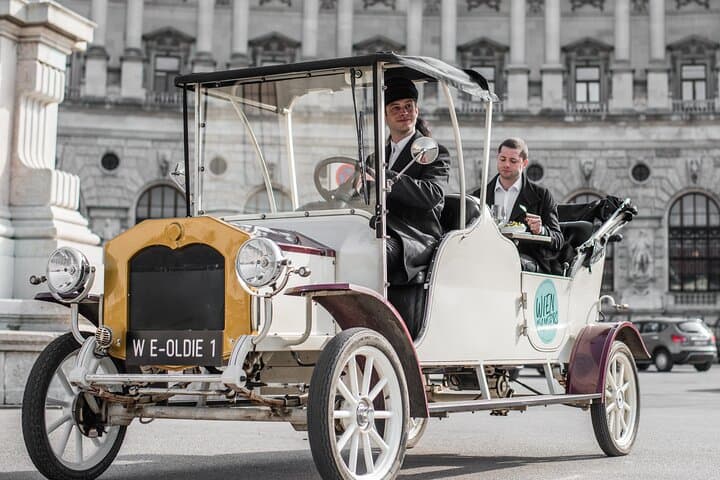 City Sightseeing Tour in an Electro Vintage Car (up to 5 people)