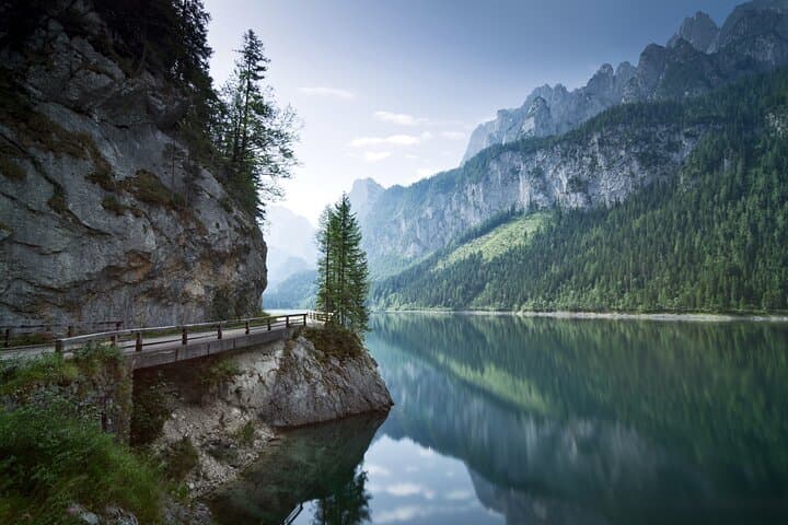 Hidden Gems: Stroll across picturesque wooden bridges and listen to the soothing sounds of the Alpine waterfalls.