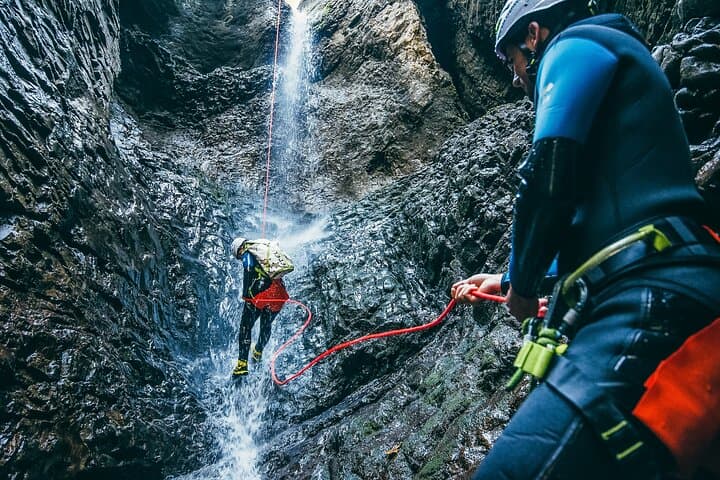 Sporty canyoning in Kleinwalsertal in the Schwarzwasserbach