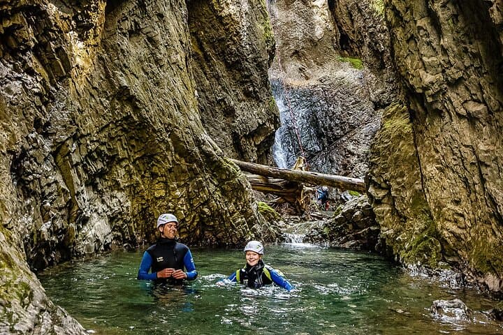 Sporty canyoning in Kleinwalsertal in the Schwarzwasserbach