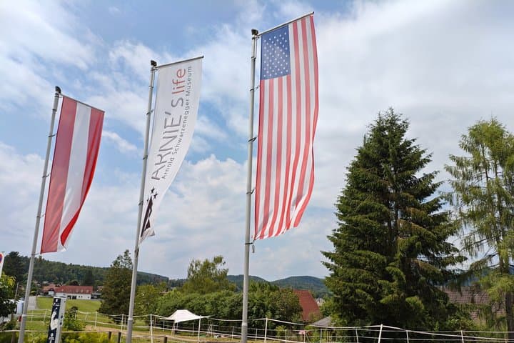 From Thal to Hollywood: The flags outside the museum symbolize Arnold's incredible journey to global stardom.