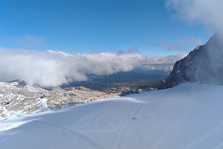 A World of Eternal Ice: Walk on the magnificent Dachstein glacier, where you can literally stand above the clouds at nearly 3,000 meters.