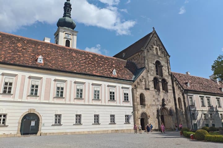 Escaping the Crowds: Journey deep into the mystical Vienna Woods to discover Heiligenkreuz Abbey, a peaceful hidden gem far from the busy city.