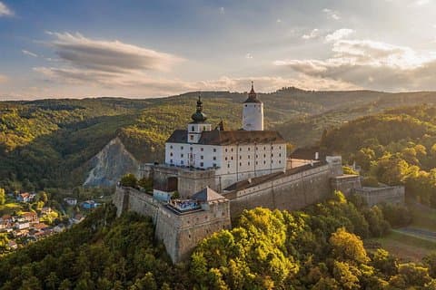 The Fortress in the Forest: Experience the dramatic and imposing beauty of Forchtenstein Castle, dominating the lush Burgenland landscape.