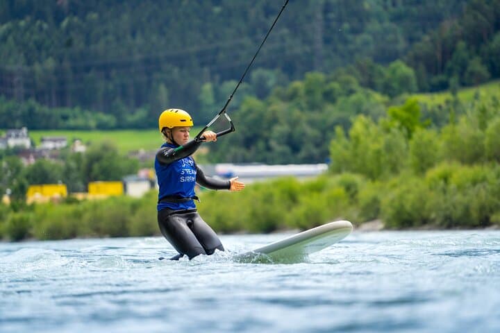 On the static rope you first learn how to get up on the surfboard and how to control your board.