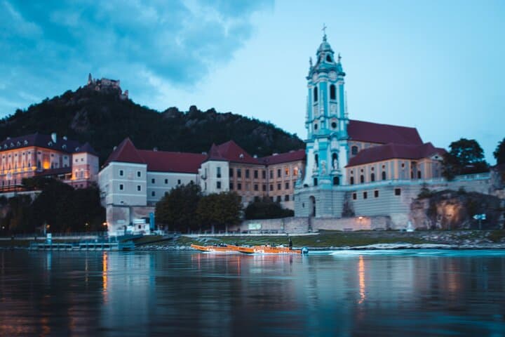 Wine tasting on traditional wooden boats in Wachau Valley